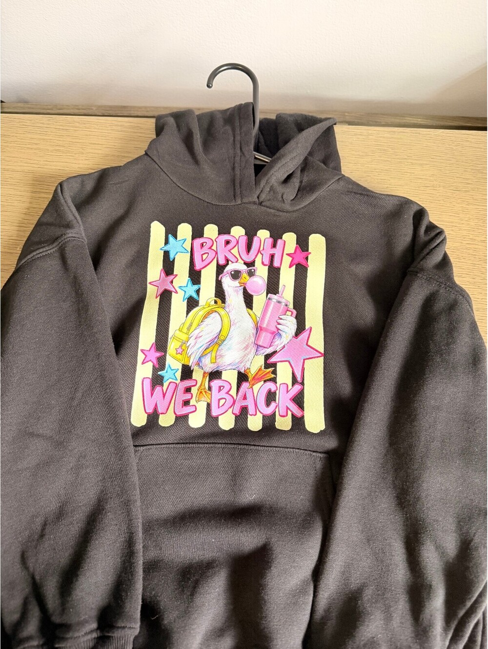 Casual Brown Hoodie with Colorful Flamingo Graphic and 'BRUH WE BACK' Text